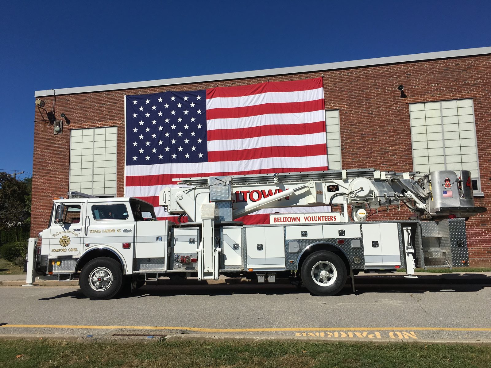 Truck 45 with flag on the building